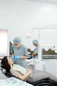 Dentist examining a patient for tooth decay at a dental clinic in Richmond Hill
