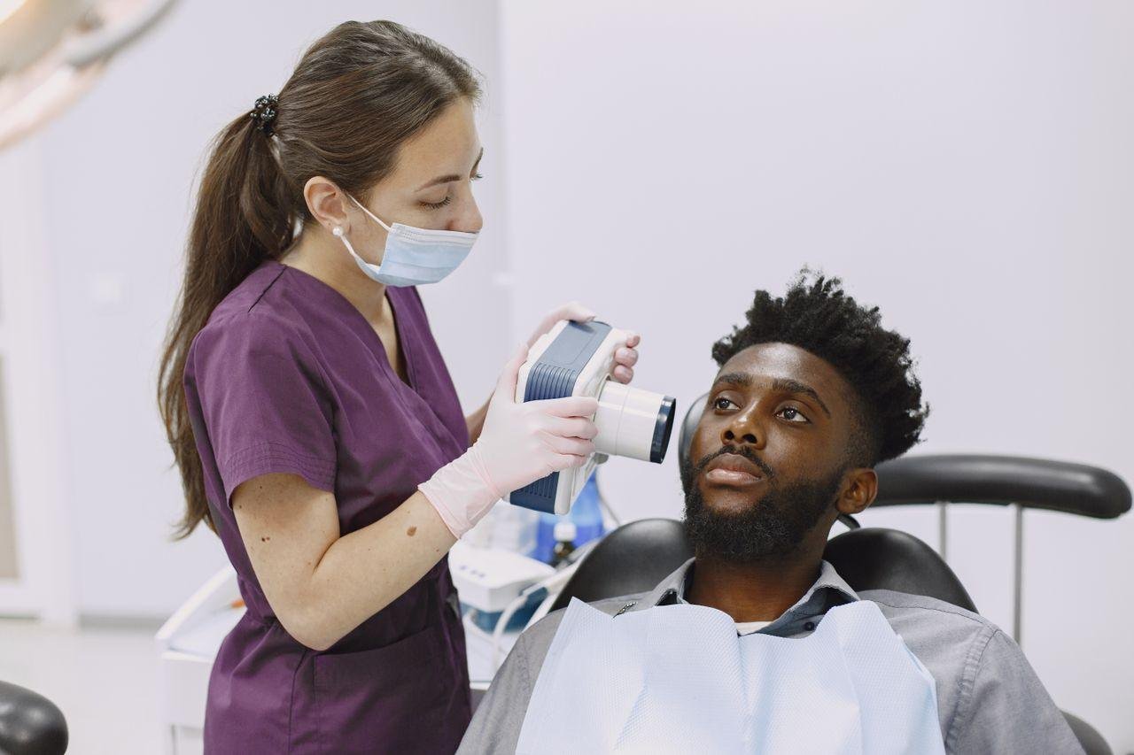 Man having a dental checkup and mouth exam