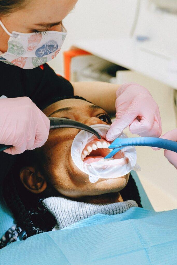 Dental professional performing a gum health checkup