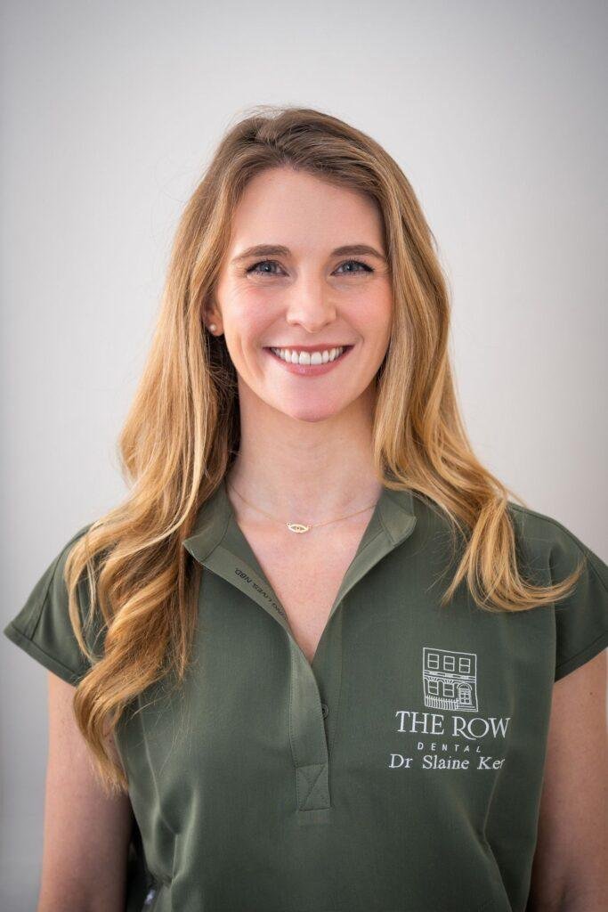 Smiling dental professional ready to provide same-day emergency care