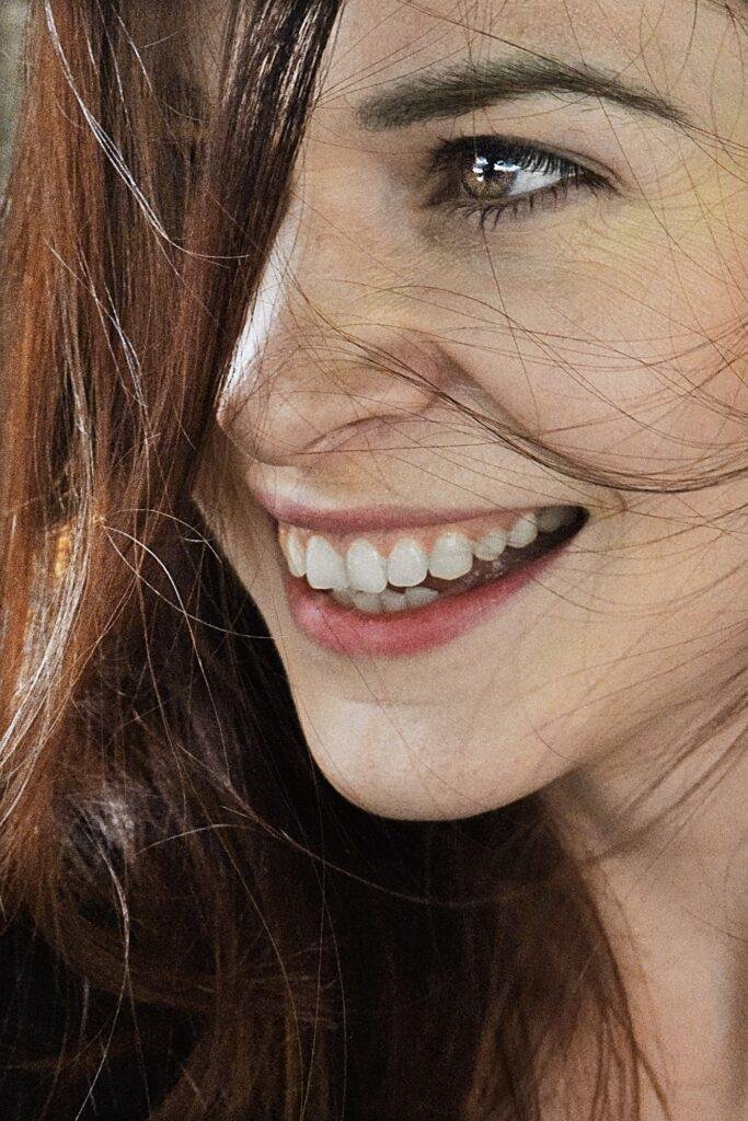 Woman with a bright, natural-looking smile